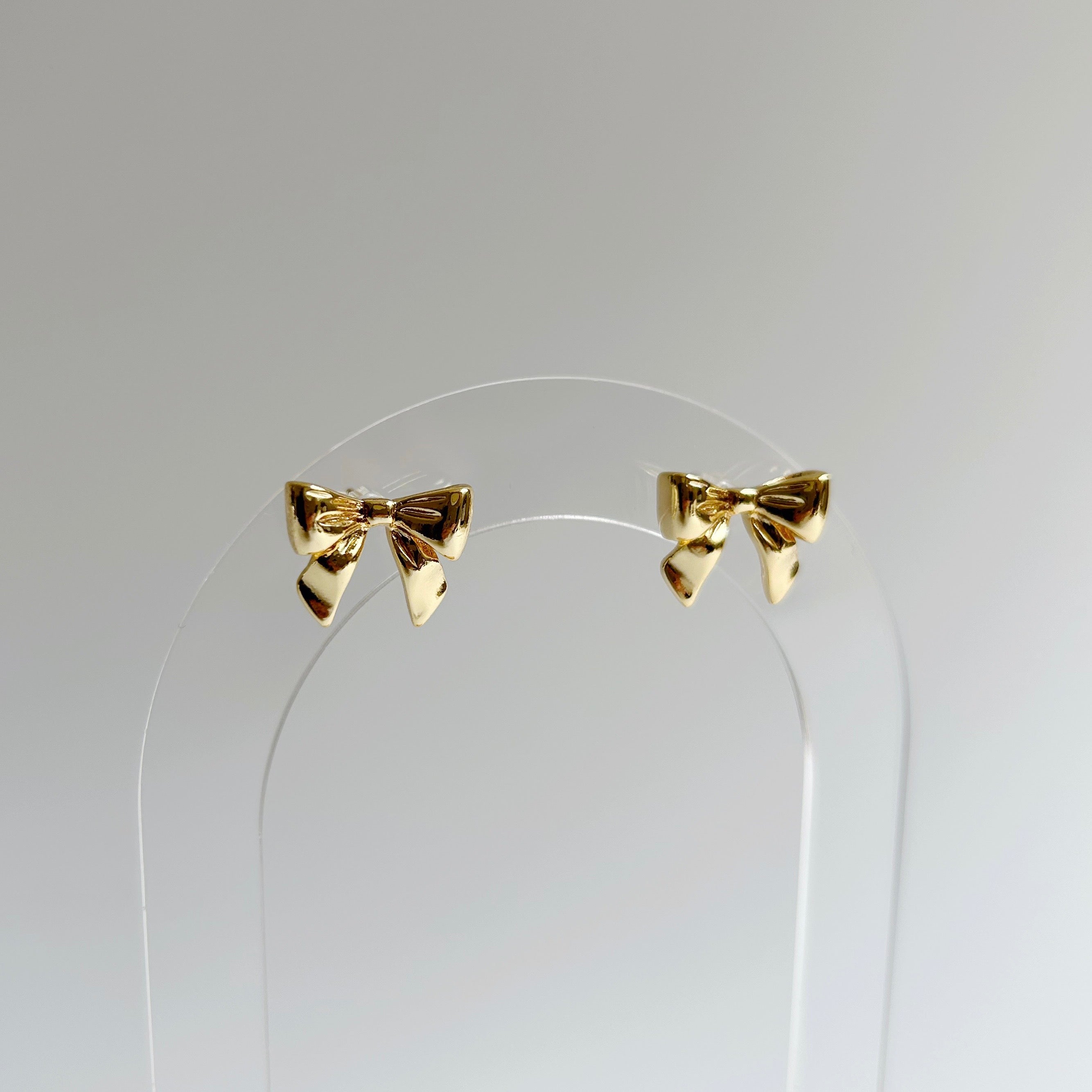 Golden Bow stud earrings