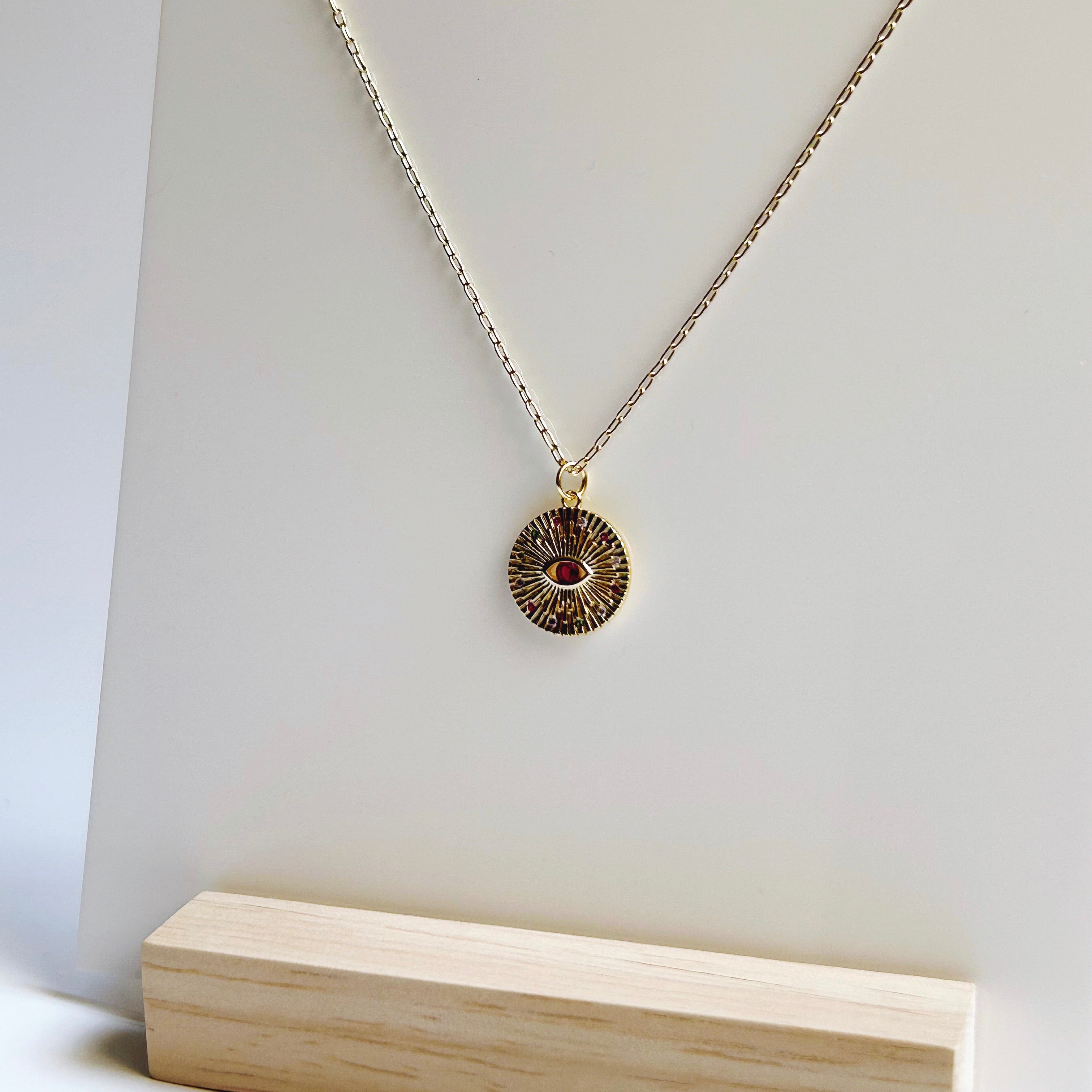 Evil eye sunburst necklace