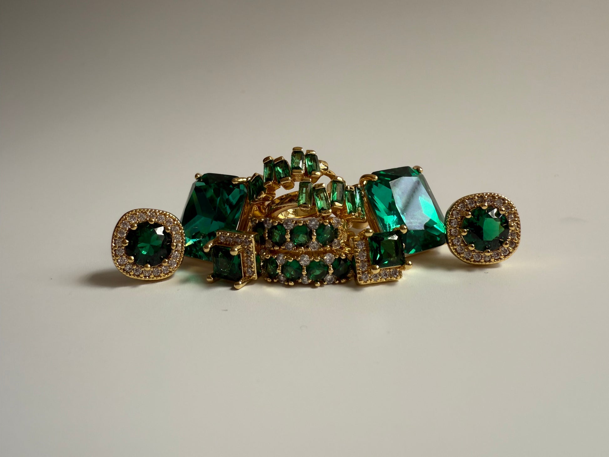 Round Emerald studs with CZ accents