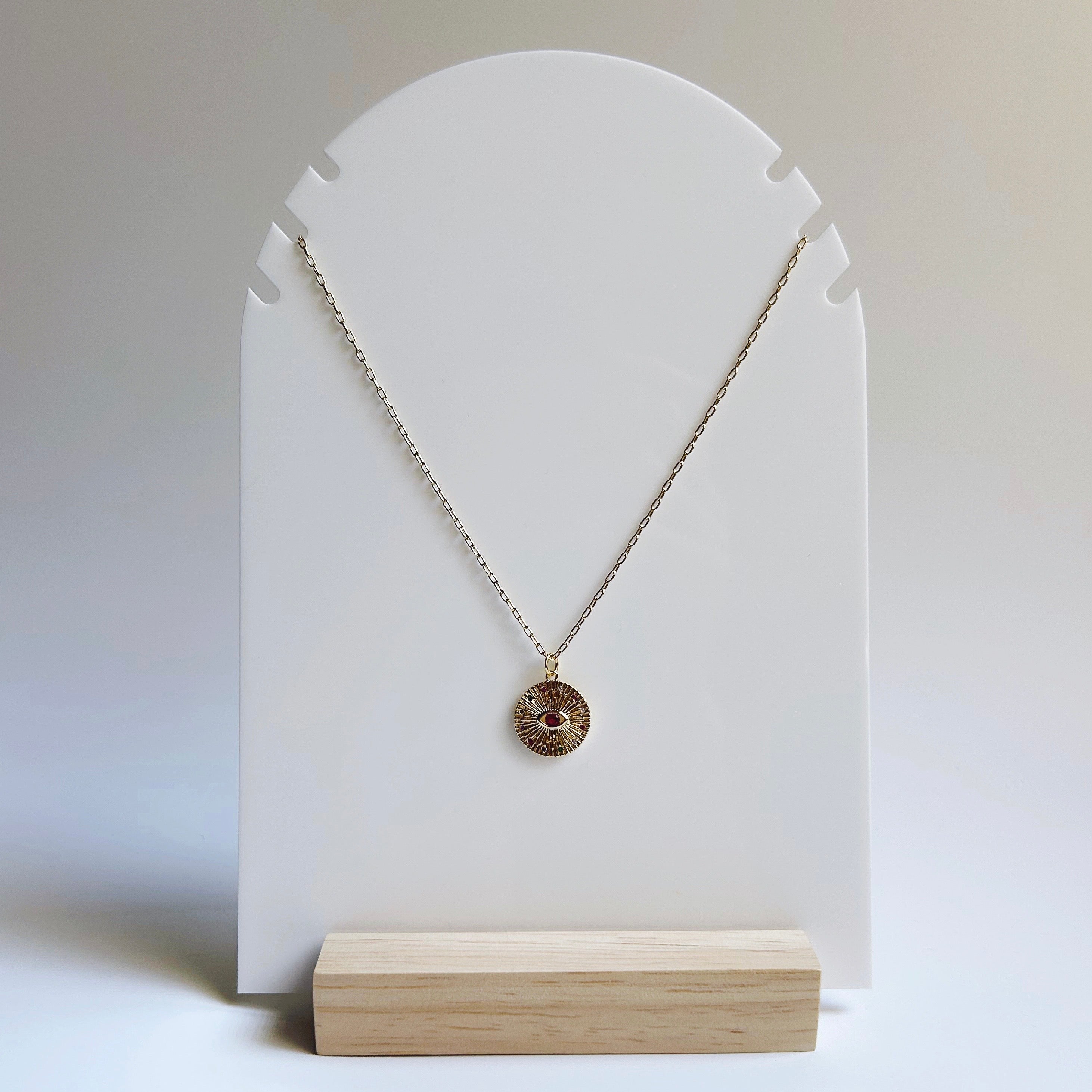 Evil eye sunburst necklace