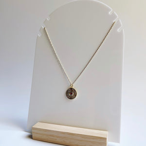 Evil eye sunburst necklace