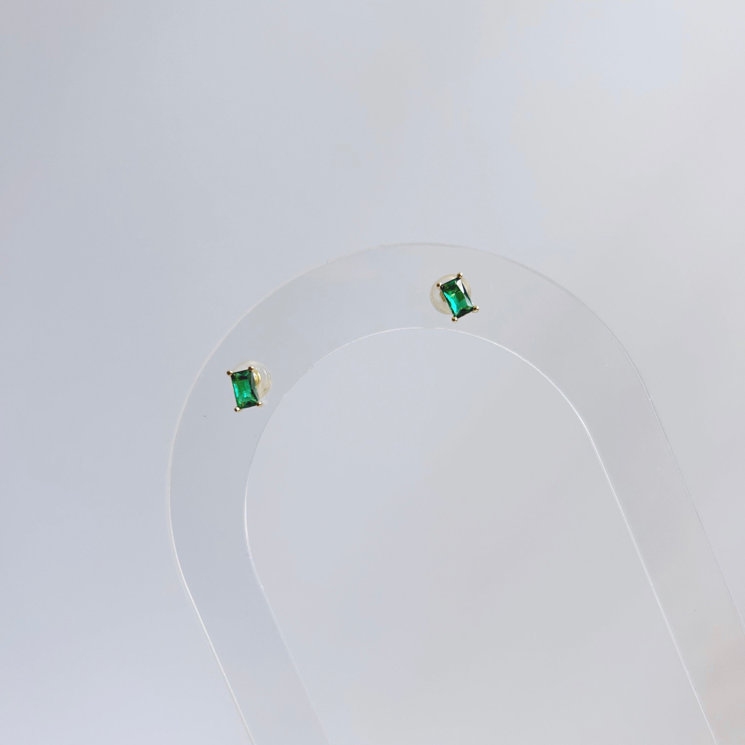 Emerald baguette studs