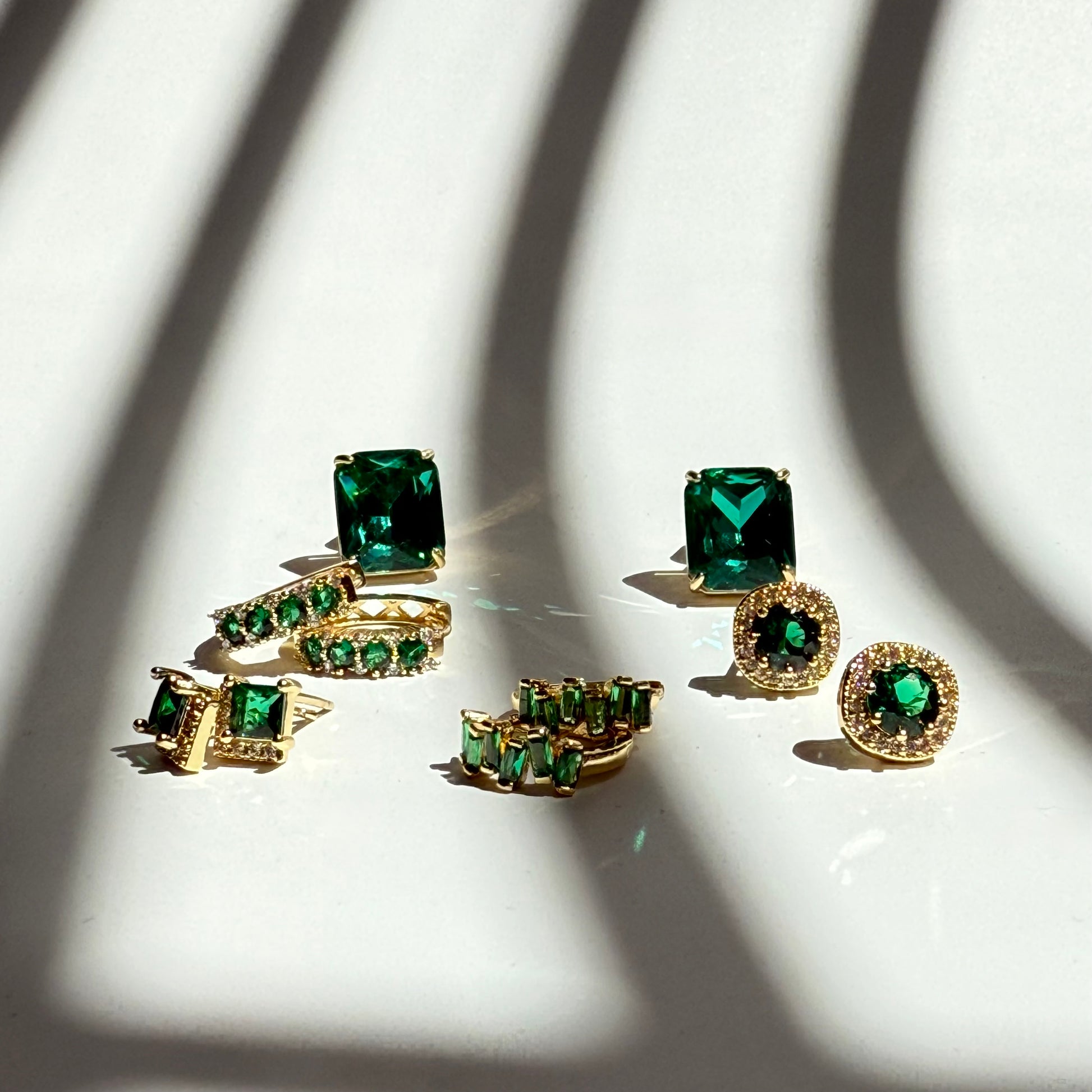 Round Emerald studs with CZ accents
