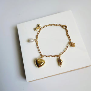 Puffy heart and shell charm bracelet