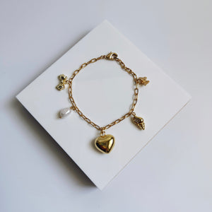 Puffy heart and shell charm bracelet